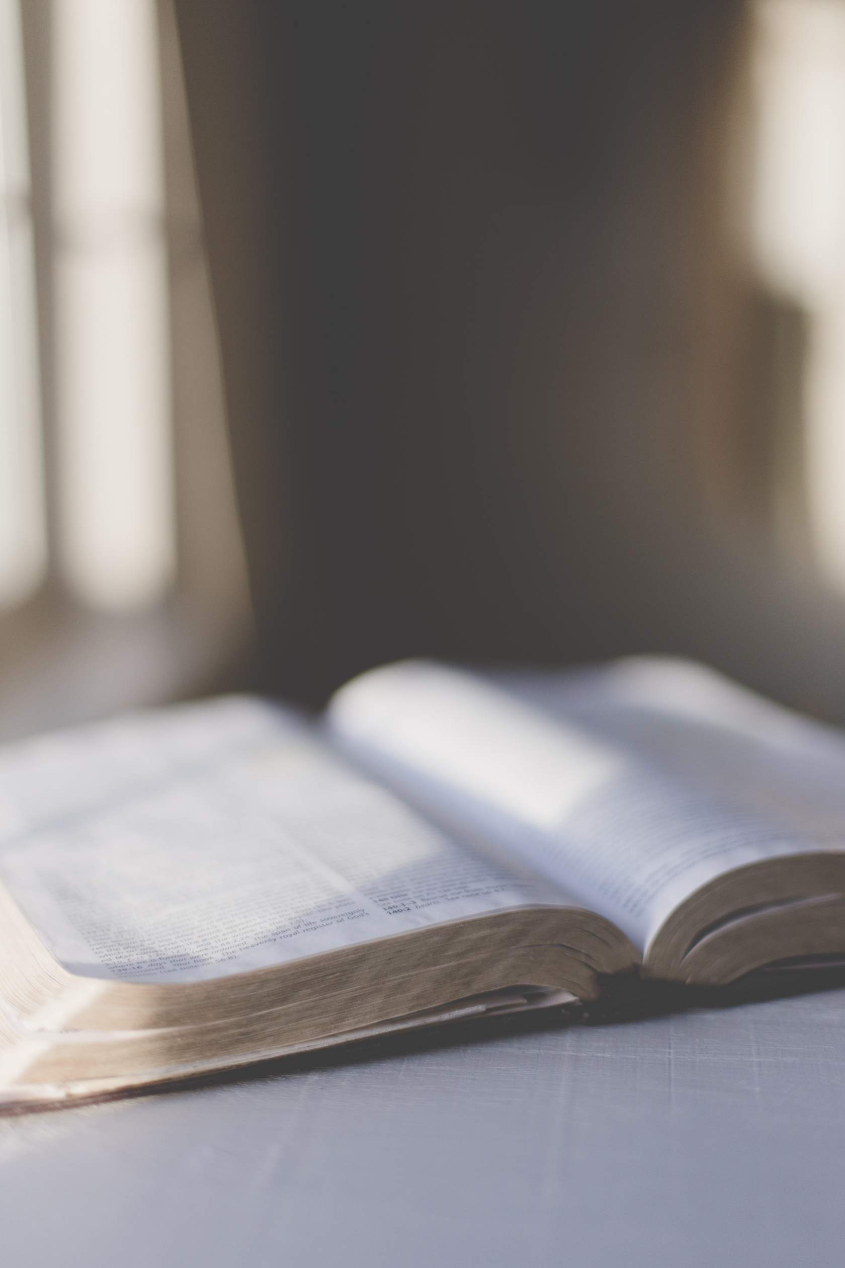 A Bible open on a tabletop